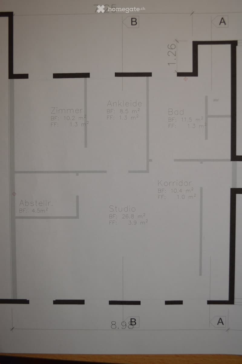 Floor plan showing a studio, bedroom, bathroom, hallway, and storage area with labeled dimensions and room names.