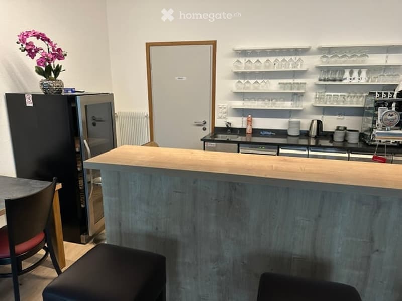 {"visible_features": [], "type": "Furnished Room", "objects": ["refrigerator", "chair", "stool", "table", "cupboard", "cup", "faucet", "sink", "cupboard", "cup", "cup", "cup", "cup", "cup", "cup", "cup", "cup", "cup", "cup", "cup", "cup", "cup", "cup", "c