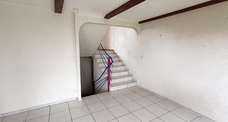 Interior hallway with stairs