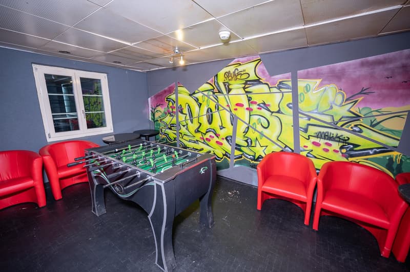 Spielbereiche / Raucherlounge