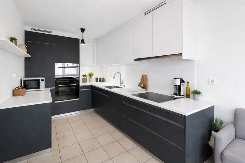 Duplex en attique de 5,5 pièces à Bursinel (3)