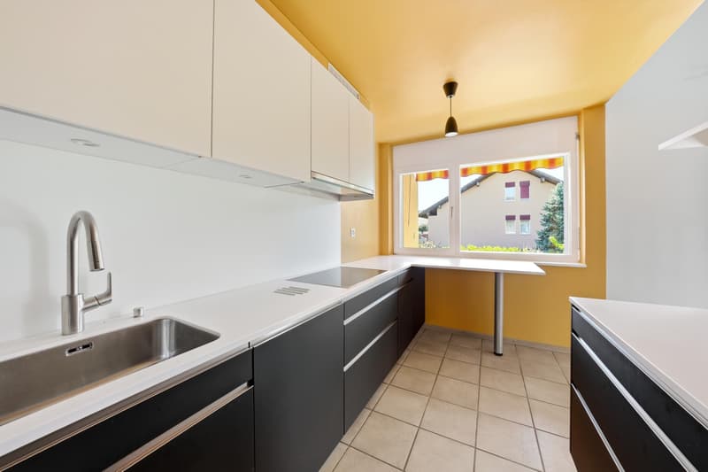 Duplex en attique de 5,5 pièces à Bursinel (7)
