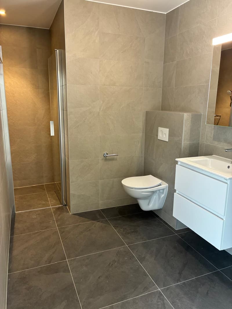 Attique – Neuf – Place de parc intérieure – Grand balcon (8)