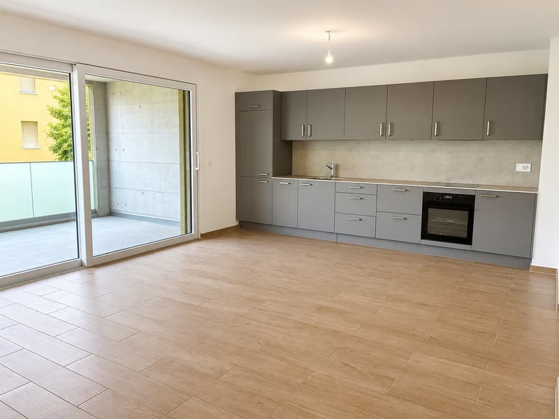1er étage – Neuf – Places de parc intérieure – Grand balcon (4)
