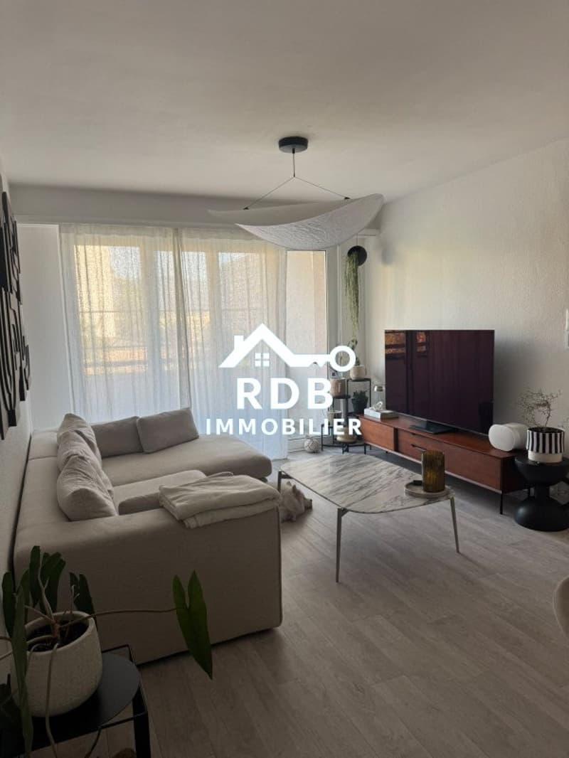 Appartement de 3 pièces au 5ème étage situé à Onex 1213 (1)