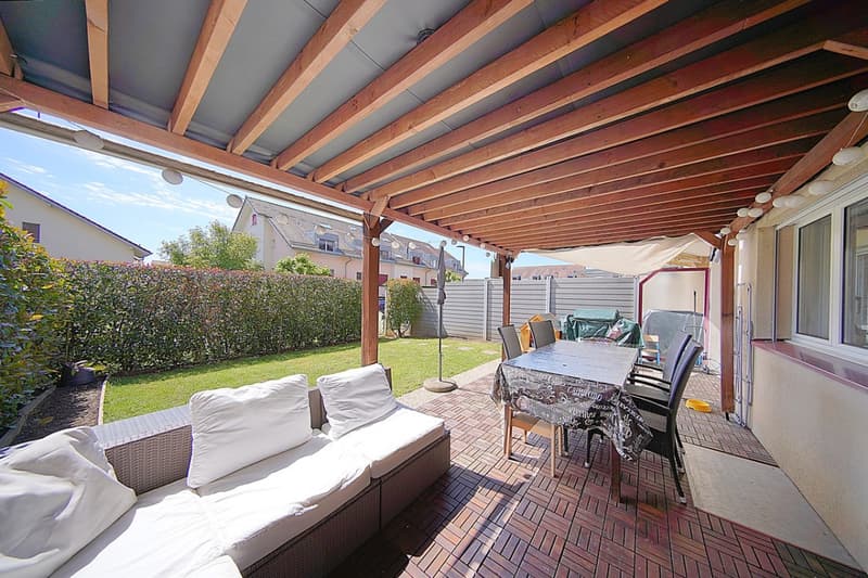 Spacieux rez-de-jardin bien situé (1)