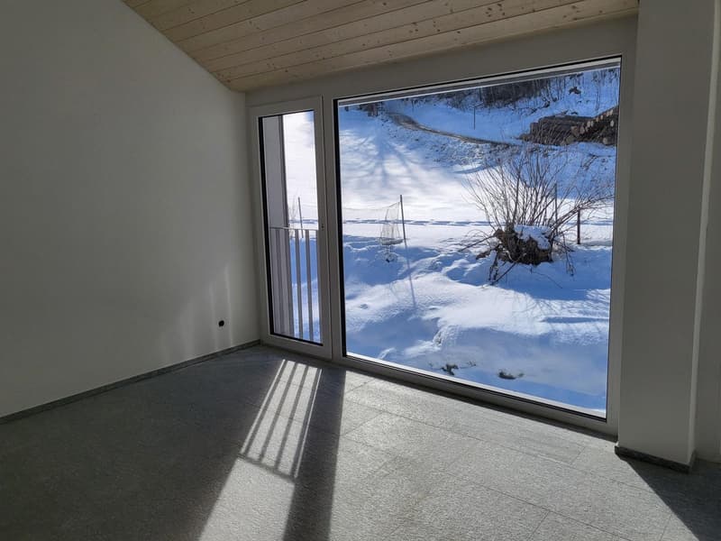 large glass windows, balcony, tiled floor, snow-covered view