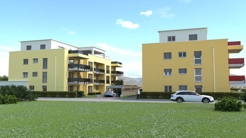 Two story building, yellow walls, white trim, balconies on upper floors, cars parked in front.