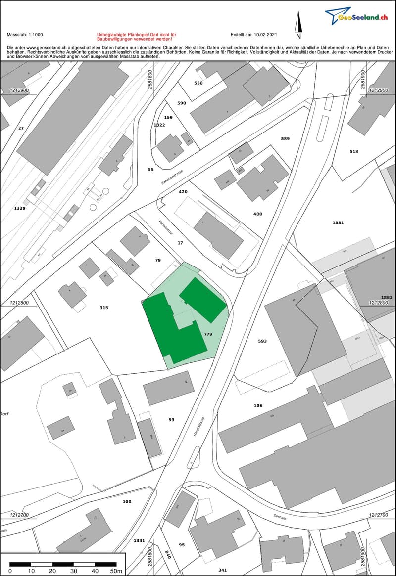 The image shows a detailed floor plan or site map. It includes several buildings, roads, and a large green area that appears to be a parking lot or open space.