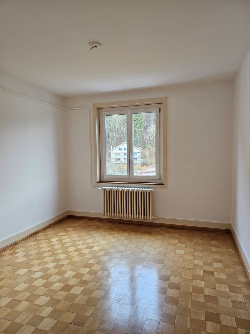empty room, parquet flooring, white walls, window, radiator, fire sprinkler, view of house