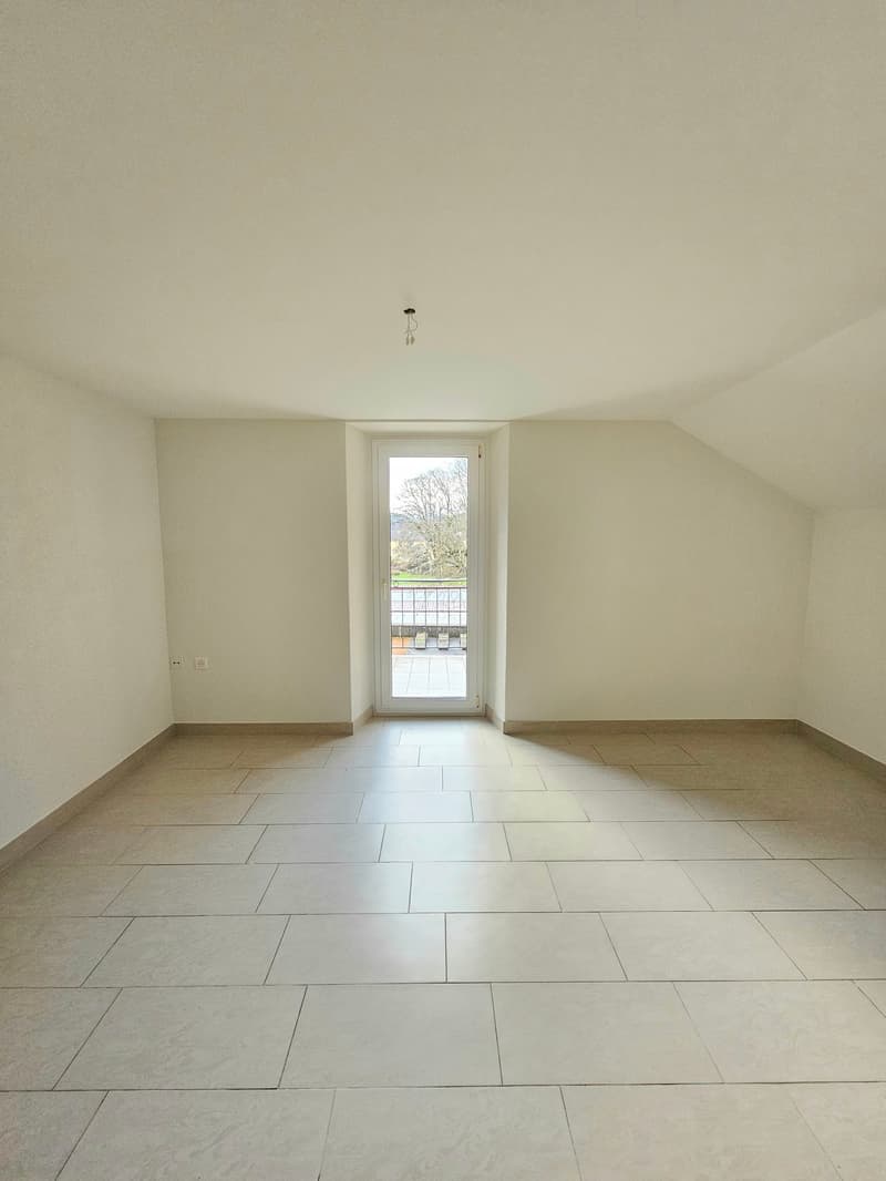 Charmant appartement de 3 pièces au centre de Fleurier avec balcon (3)