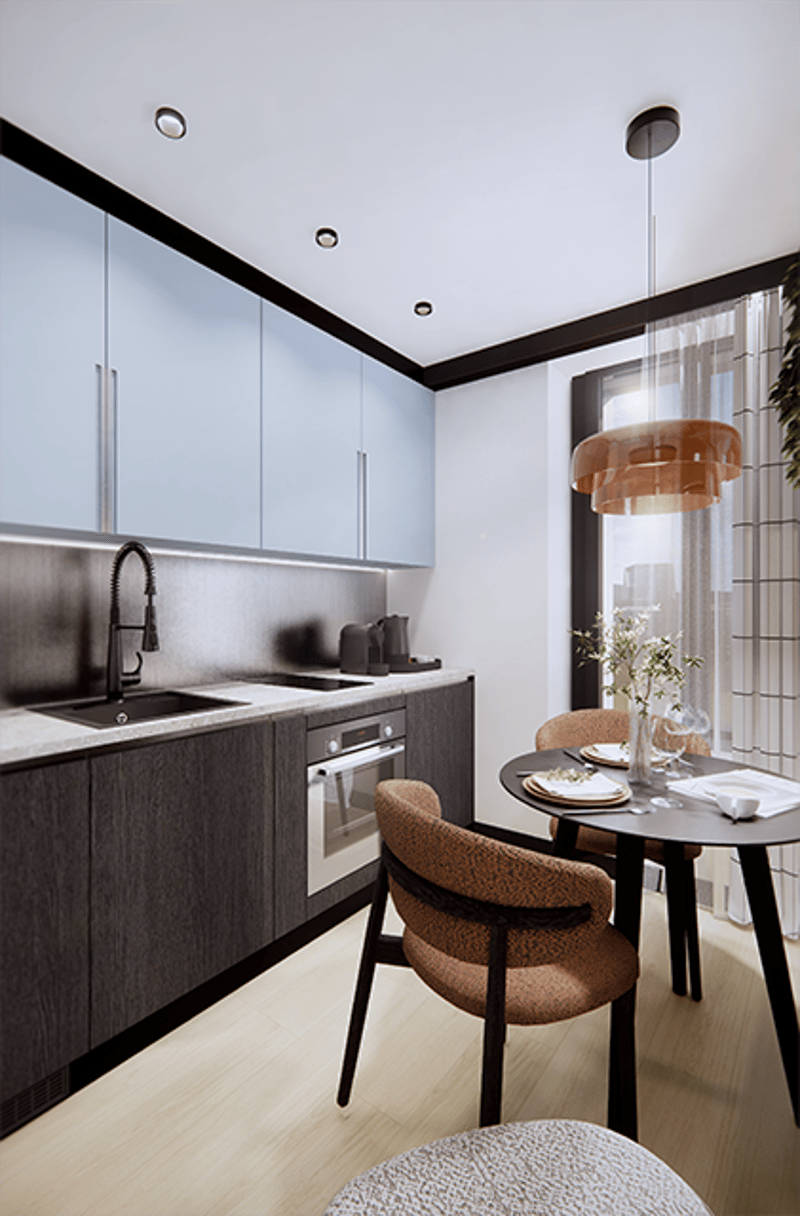 modern kitchen with wooden floors, white ceiling, silver cabinets, black and white countertop, a faucet, an oven, and a dining area with a wooden table and chairs