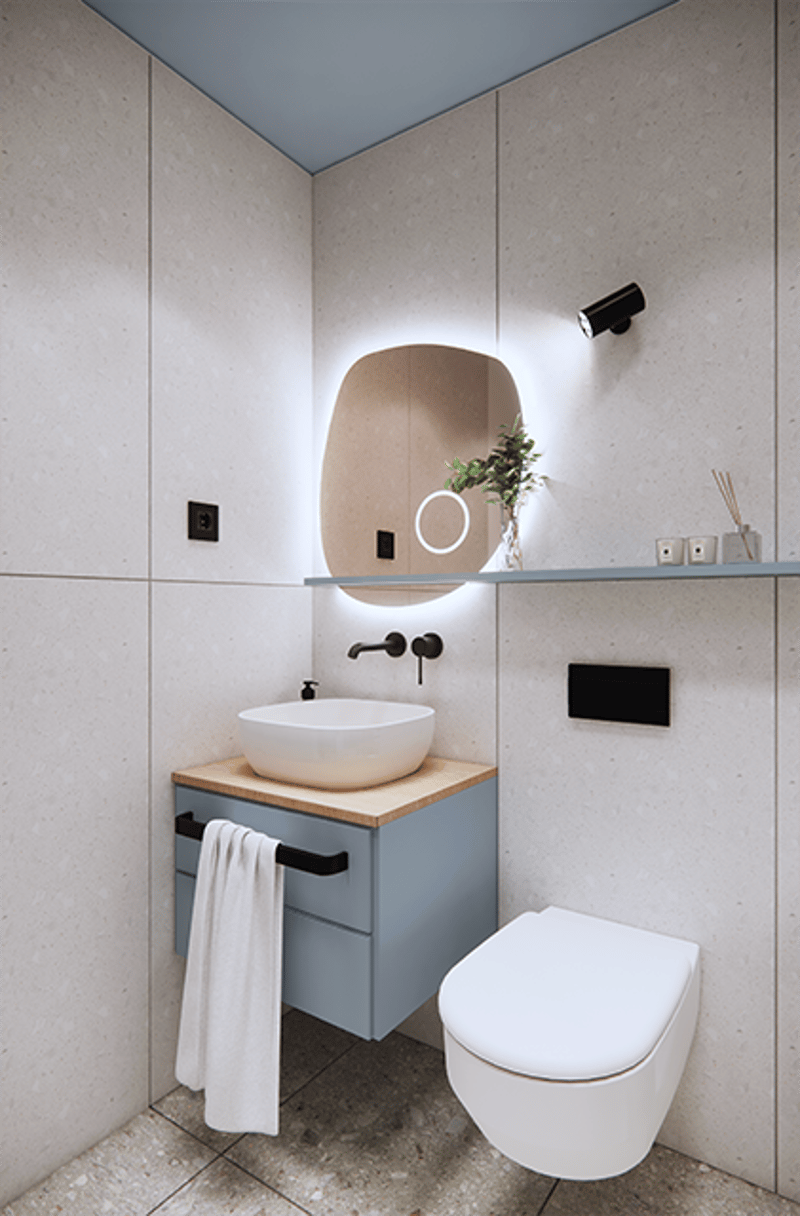 White sink, silver faucet, round mirror, white floor, light fixtures