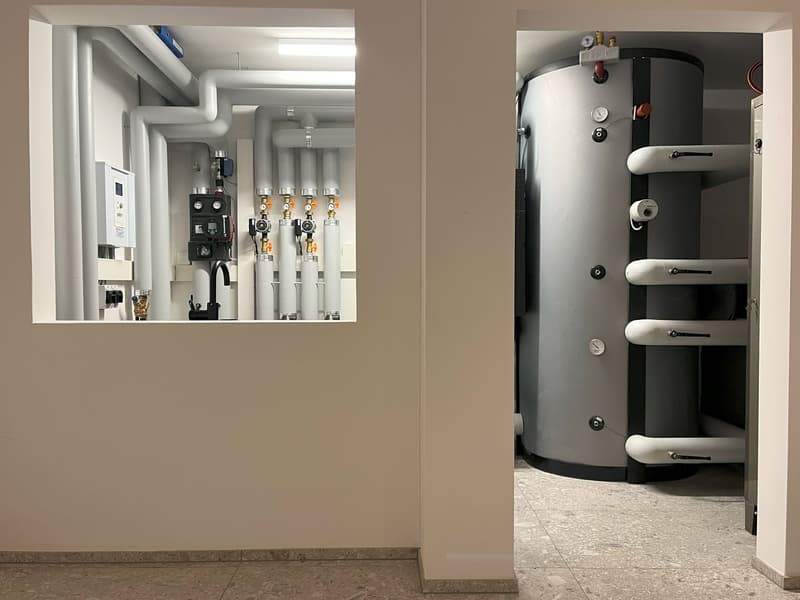 central heating system, hot water tank, pipes, gauges, meters