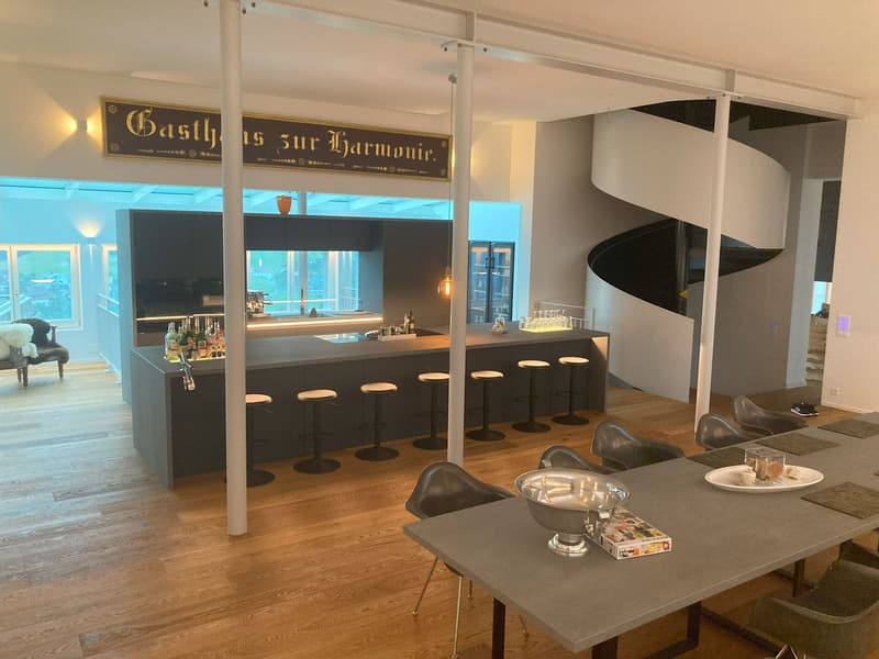 modern kitchen island, seating area, dining table, spiral staircase, open windows