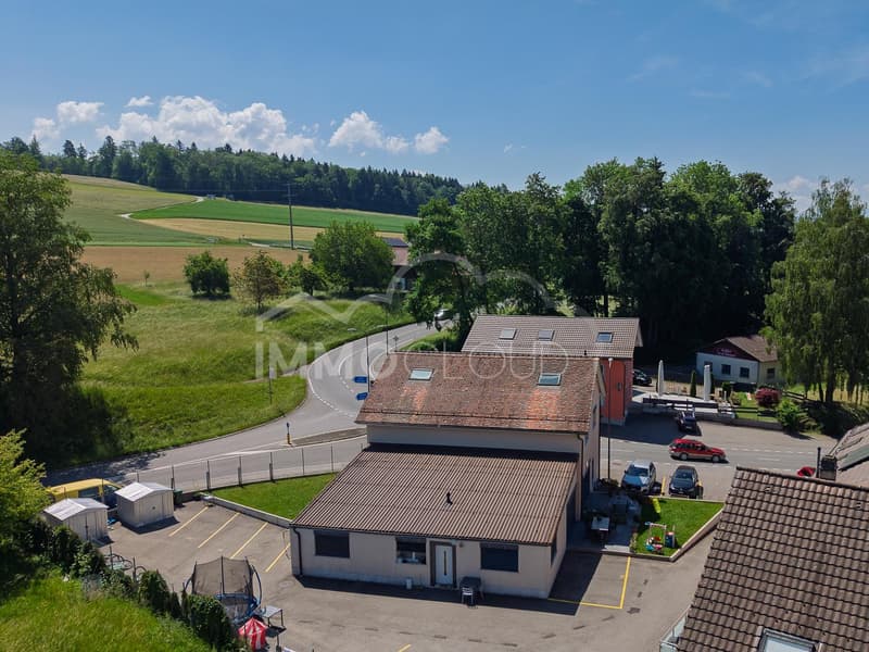 Immeuble de rendement rénové avec réserve de développement (11)
