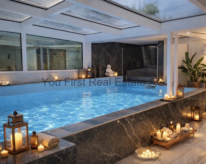 Luxus-Wellness-Oase: Exklusiver Indoor-Pool mit Glasdach und Naturstein-Ambiente