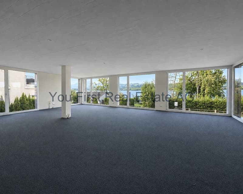 Umlaufender Fensterfront und Seenblick