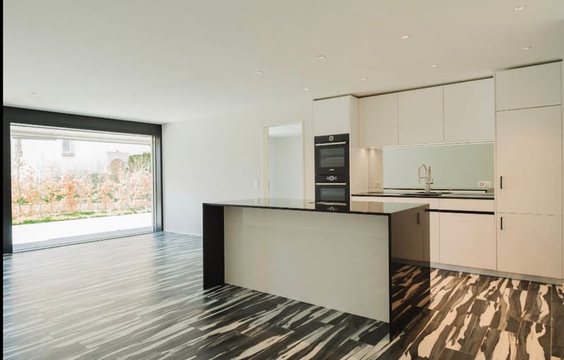modern kitchen, island, white cabinets, black and white flooring, large windows, double oven