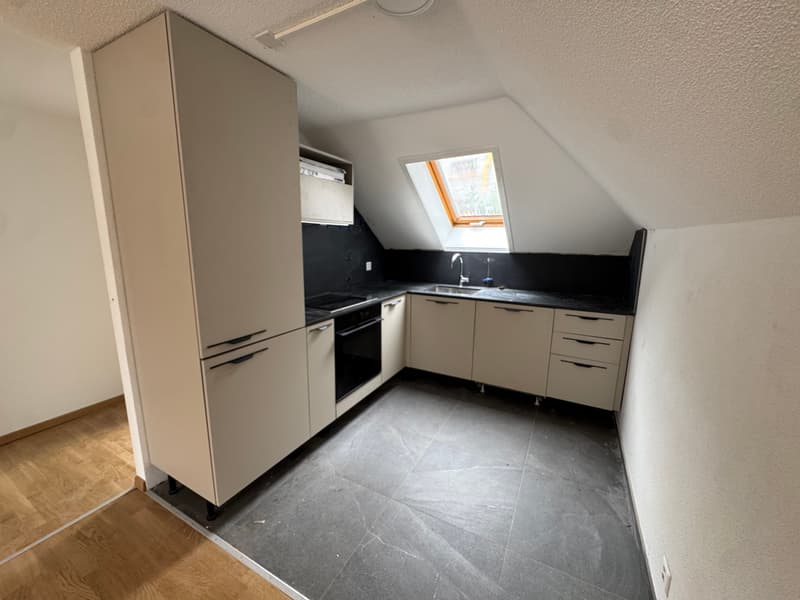 Immeuble de rendement entièrement rénové à Saint-Imier – 5.7% net (14)