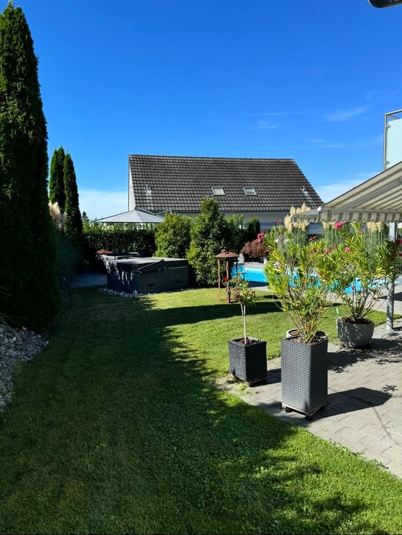 large green lawn, swimming pool, trees, plants, house, shed, patio