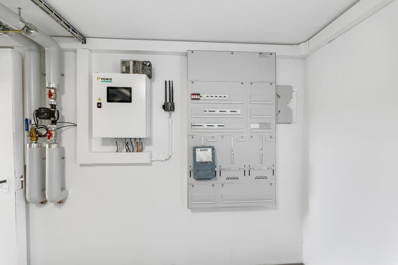 white walls, electrical panel, gas meter, pipes, ventilation system