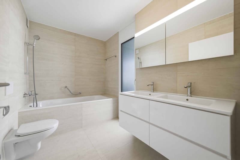 Appartement neuf de standing - 5.5 pièces en angle avec terrasse et jardin privatif (5)