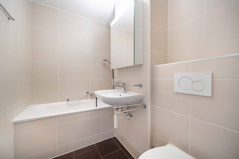 Bel appartement de 2,5 pièces en rez de jardin et plein centre ville ! (4)
