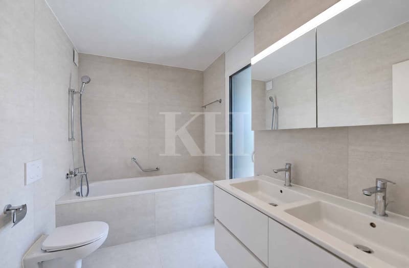 Appartement de 5,5 pièces neuf avec magnifiques finitions en rez de jardin ! (6)