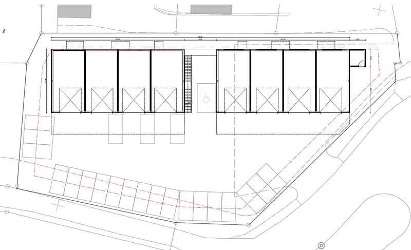 The image shows a floor plan with 4 separate units or spaces. Each unit has a rectangular layout with a central space and what appears to be an entrance or doorway on each side. There is also a parking area or lot visible along the bottom of the plan.