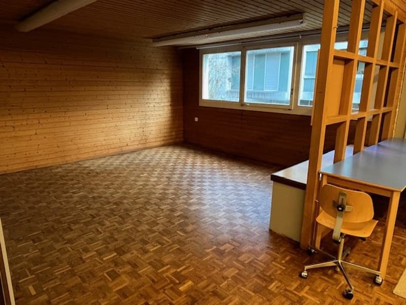 wooden walls, wooden floor, windows, office chair, desk