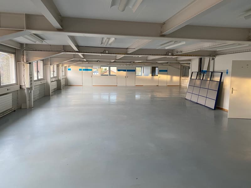 Spacious room, white walls, white ceiling, large windows, white floor