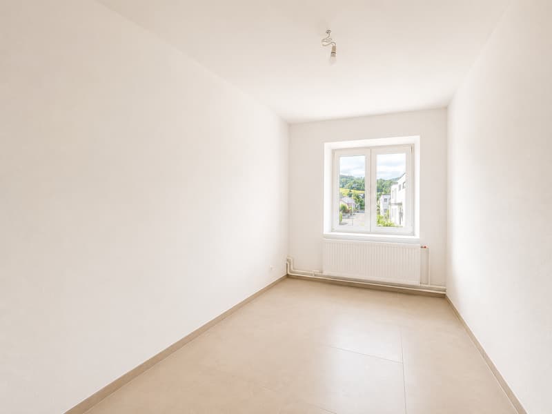Magnifique 4,5 pièces entièrement rénové de 97 m² au coeur de Rossemaison (6)