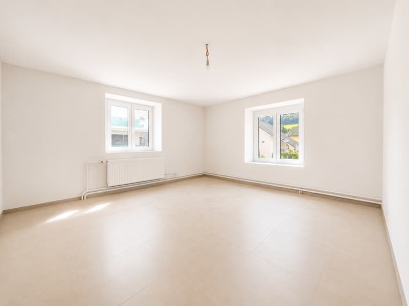 Magnifique 4,5 pièces entièrement rénové de 97 m² au coeur de Rossemaison (4)