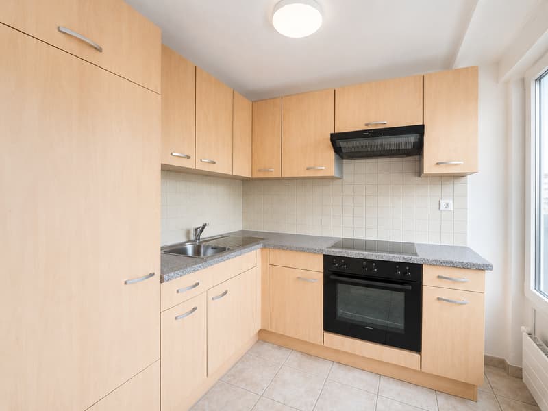 Appartement 2.5 pièces avec balcon et belle vue au 5ème étage – Le Locle (1)