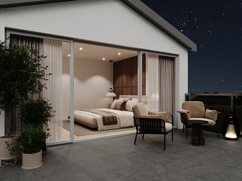 Spacious bedroom with large windows, sliding glass doors leading to a balcony or terrace, wooden accent wall, plush bedding, and comfortable seating area. The night sky is visible through the windows, creating a cozy and relaxing atmosphere.