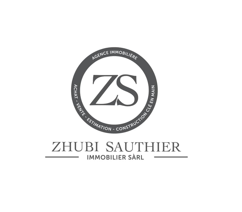 Logo of Zhubi Sauthier, showing a circle with 'ZS' in the middle and some words around it.