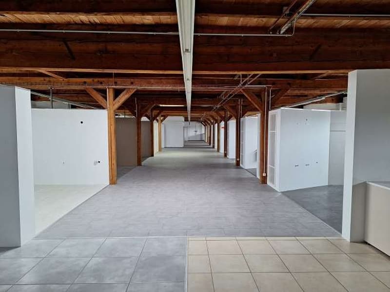 empty room, wooden beams, tiled flooring, long hallways, bright lights