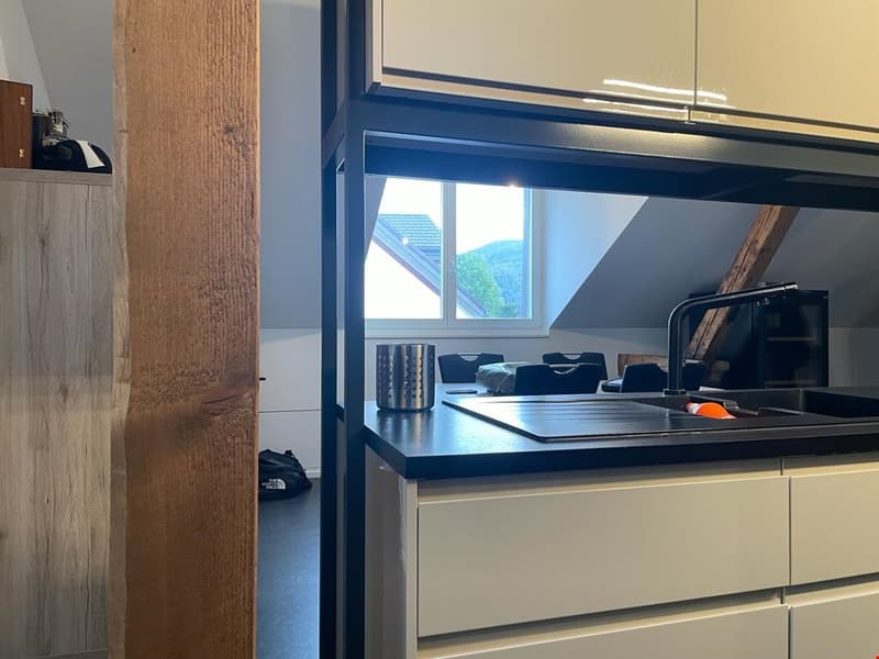 modern kitchen with white cabinets, wooden counter top, open shelving, stainless steel appliances, sink, faucet, silver canister, glass window