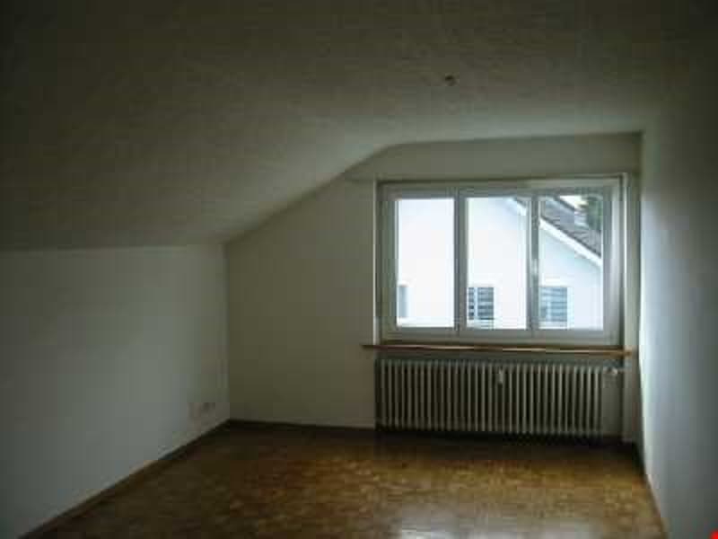 empty room, white walls, wooden floor, window, radiator