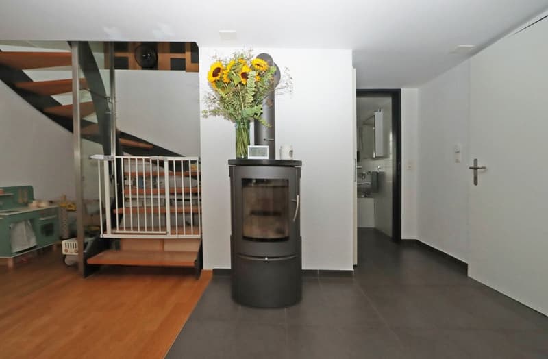 Zimmer mit Cheminée (4.5 Zimmerwohnung 2.OG links)