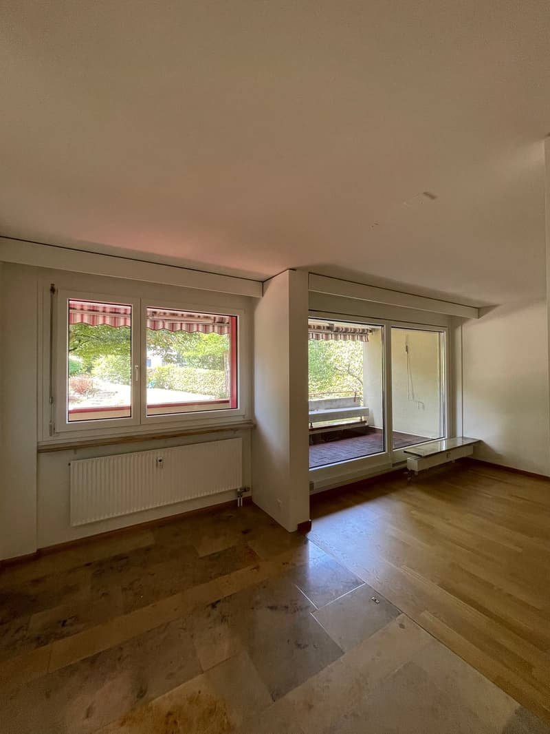 Wohn-/Essbereich mit Zugang zum Balkon