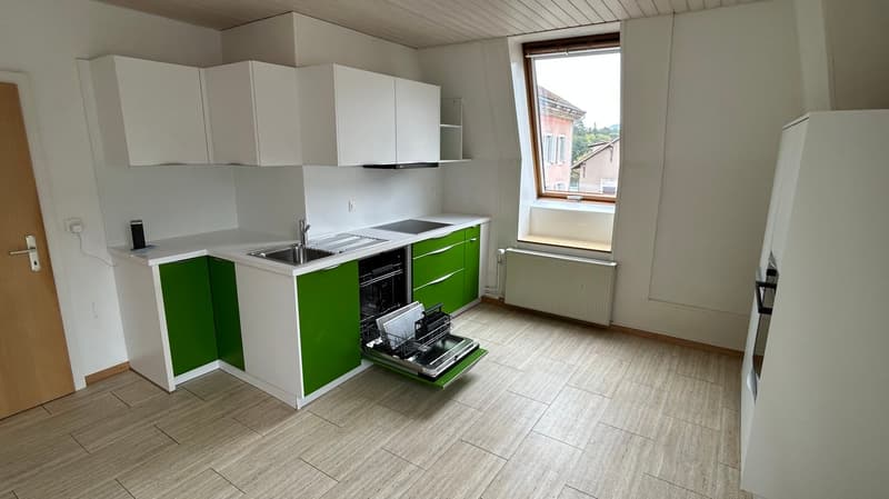 empty modern kitchen with dishwasher, sink, cabinets, tile floor