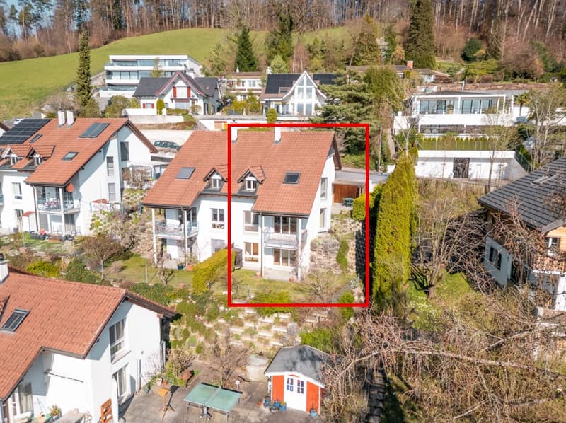 2 story house, brown roof, white walls, balcony, garden, solar panels