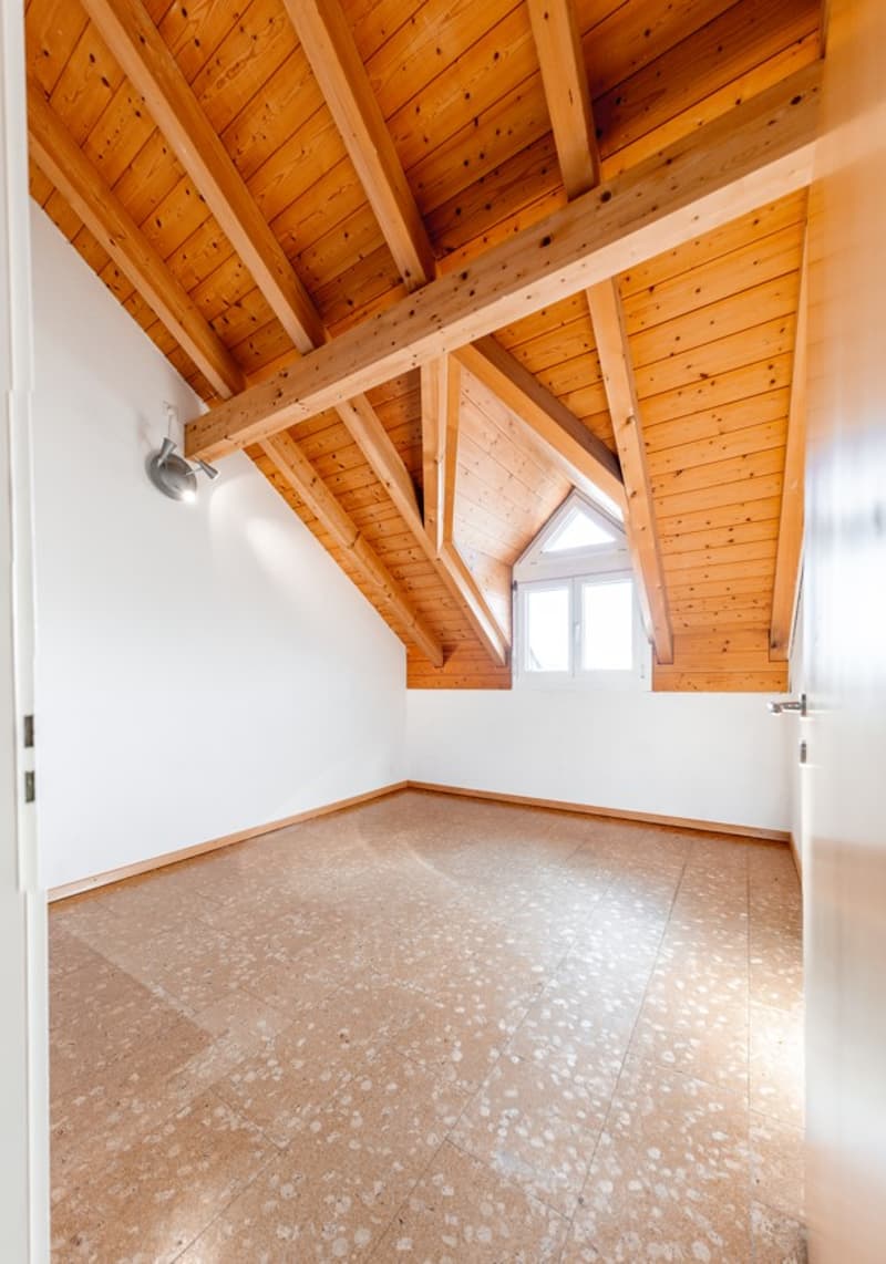 empty room, wooden ceiling, white walls, tiled floor, small window