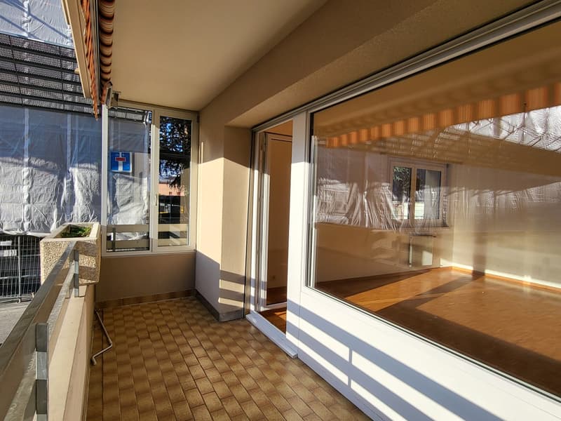 empty balcony with floor, rail, windows, sliding door