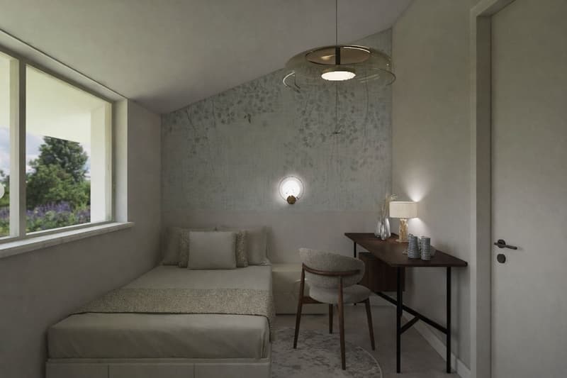 Small bedroom with bed, desk, chair, and window