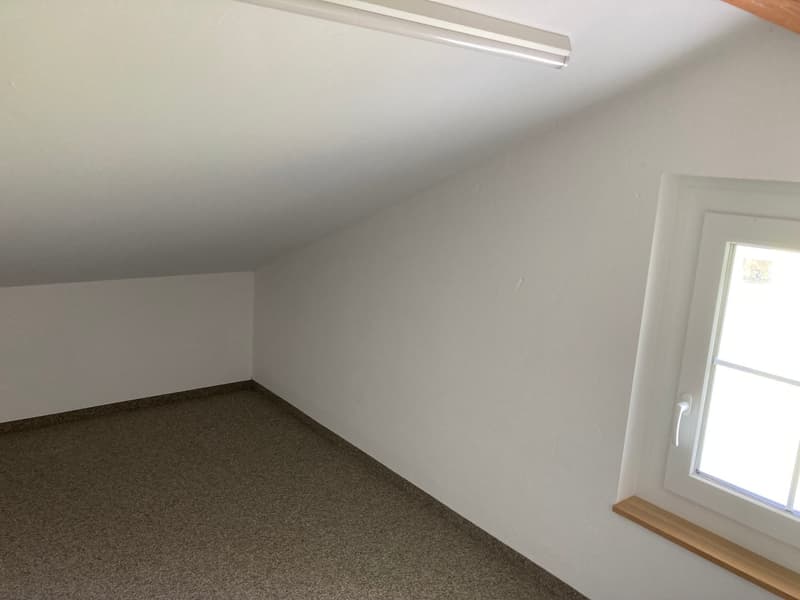 empty room with white walls, carpet floor, white window, wooden windowsill