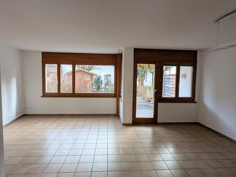 empty room, large windows, tiled floor, sliding glass door, white walls