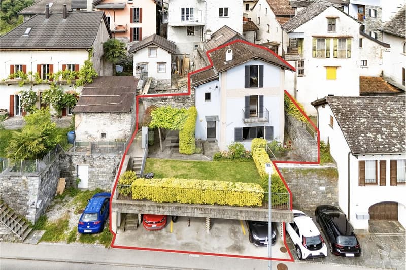 Casa con giardino e 4 posteggi (3)